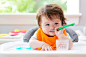 Happy little baby boy eating food by Michiko Tierney on 500px