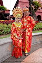 A Malay bride and groom in their traditional Malacca Malay costume MALACCA, MALAYSIA