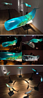 Shipwrecks and Deep Ocean Scenes Encapsulated Inside Translucent Whale Sculptures: 