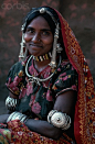 Jhabua, India |  Bhil Woman in Traditional Dress © Lindsay Hebberd/Corbis