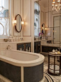 A more classic bathroom, yet a very distinguished one. Such golden details go amazingly well with grey marble