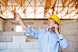 Senior architect with smartphone at the construction site. by Jozef Polc on 500px