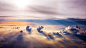 General 2000x1125 landscape clouds horizon aerial view sun rays