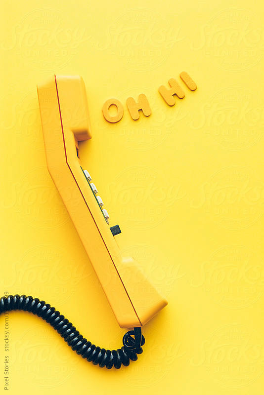 Old yellow phone wit...
