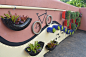 garden junk ideas wall art bicycle tires vertical planters tin can