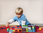boy with toy building blocks_创意图片