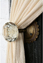 Vintage door knobs as drapery tiebacks