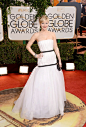 2014 Golden Globes red carpet
Jennifer Lawrence, in Dior Haute Couture, with a Roger Vivier clutch. 