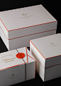 Gorgeous packaging! The white and gold are very classic but the red lining makes the design more unique and eye catching.: 