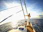 Caucasian woman standing on yacht deck by Gable Denims on 500px