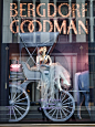 a window display with an old fashioned horse and buggy