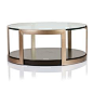 Product Info Dimensions Construction MANHATTAN GLASS TOP ROUND COFFEE TABLE Artisan metal wraps this circular table with chic retro style, with a rich matte gol