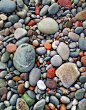 The multi-coloured pebbles on New Aberdour beach are the result of glacial deposits which form some of the soft sandstone / composite rock found at this location.