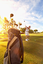 Caucasian golfer hitting ball on golf course by Gable Denims on 500px