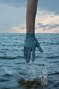 Transfer by Kevin Corrado : For the project ‘Transfer’, Kevin Corrado dips his hand in paint and places it in front of a landscape, creating an interesting visual effect. The series began as a playful idea of the ocean being a giant sea of blue paint rath