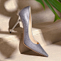 Add a playful touch to your wardrobe with the #jimmychoo silver ABEL pump in subtle glitter.