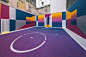 paris' pigalle basketball court canvassed in a gradient of smooth, iridescent hues