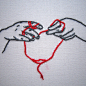 hands with red string by whimsiology on Flickr.