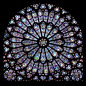 玫瑰窗（The rose window）| 也称玫瑰花窗，为哥特式建筑的特色之一，指中世纪教堂正门上方的大圆形窗，内呈放射状，镶嵌着美丽的彩绘玻璃，因为玫瑰花形而得名。