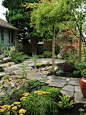 Design ideas for an asian partial sun stone landscaping in Seattle.