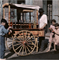 Nat Geo Image Collection 在 Instagram 上发布：“Photo by Edwin L. Wisherd: Children gather by a vendor selling "snowball" treats in New Orleans, Louisiana. Published in National…”