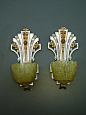 vintage slip shade wall light fixtures from the late 20s and early 30s manufactured by the Lincoln Co.  http://www.vintagelights.com/product/1/vintage-art-deco-pair-lincoln-slip-shade-wall-light.html