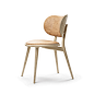 The Dining Chair : ProductThe Dining Chair is an elegant and versatile chair designed by Space Copenhagen for Mater. The minimalistic design of the chair with its organic shape and neutral colours makes it highly versatile, appropriate for contemporary an