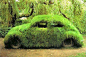Danish artist Morten Flyverbom covered this VW Beetle in grass as part of his collection of ecological art pieces.