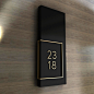   The unit number   in painted acrylic and brushed brass.  