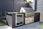 Outdoor cooking is made easy with this custom BBQ station beautifully clad in charcoal porcelain tiles and granite countertop. The premium Twin Eagles stainless steel grill with built-in fridge and drawer system are conveniently positioned to assist the o