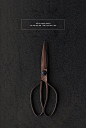 I love these classic scissors and the graphic design in dark tones.