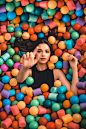 Woman on Plastic Balls