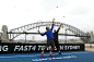Roger Federer and Lleyton Hewitt play tennis during the launch of Fast4 Tennis in Sydney. - Getty Images