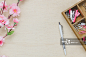 Close-Up Of Flower With Office Supplies On Table_创意图片