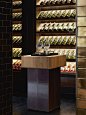 Interior Designer Profile - Carlisle Design Studio. Wine room with concealed lighting