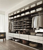 Walk-in closets are one of the most practical divisions in the modern bedroom design | Discover more: <a href="http://www.bocadolobo.com" rel="nofollow" target="_blank">www.bocadolobo.com</a>