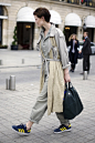 Saskia de Brauw in DEREK LAM trench, CALVIN KLEIN jumpsuit, black GIVENCHY bag, and blue & yellow ADIDAS sneakers. #Street Style# #欧美#