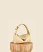 Drop Duffel - Cream : Introducing the Drop Duffel, our first soft duffel bag crafted from a supple and soft Italian leather. Lift the gold Egg-shaped charm to open the Drop Duffel, and you’ll find a spacious interior for long wallet, iPhone Pro Max, short