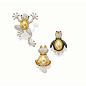 SET OF THREE GEM-SET, CULTURED PEARL AND DIAMOND BROOCHES Comprising: a penguin with a body pavé-set with black diamonds and a cultured pearl belly, a seated cat, the posterior body composed of a golden cultured pearl, and a frog similarly-set with brilli