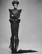 Sculptural Fashion - dress with bold 3D contours; elegant futuristic fashion photography