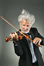 拉提琴的音乐家高清图片 - 素材中国16素材网