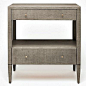 The unique proportions of the Conrad Double Nightstand are both sensible and modern. This accent furniture's finish is resin-cast from raffia, making it much more durable and refined than the actual woven material. Two drawers provide storage while a midd