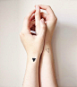 #tattoo##纹身##图案#Keep your energies in balance with a tiny triangle on each wrist — one all black and one an open line: 