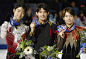 KENT United States Japan's Takahiko Kozuka Yuzuru Hanyu and Tatsuki Machida hold their gold silver and bronze medals at Skate America in Kent...