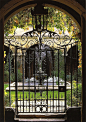 The iron gate and entrance to the Small Cloister at Westminster Abbey. London