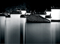林学军---徽韵。作品拍摄于2009年8月，拍摄于婺源县古坦乡的菊径村，黛瓦、粉壁、马头墙的房屋，在侧逆光的照射下非常有婺源徽派建筑特色，强化古建筑的韵味。