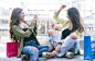 Two young women having fun in the city center by Cristian Negroni on 500px