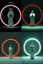 A Chinese kongfu master standing in front of a large circle wearing whiteTaiQi dress in the dark, in the style of rendered in cinema4d, emotive surreal character studies, minimalist sculpture, light emerald and red, mirror rooms, life - like avian illustr