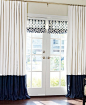 I like the combo of the color block bottom curtains and the pattern on the window valances.