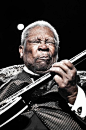 BB King by Jerome Brunet I can almost hear the note screaming and torquing out...great shot for this subject. The only thing is the spotlight near his head... Live shots are hard to get the way you need them....I'd be tempted to use edit to slightly darke